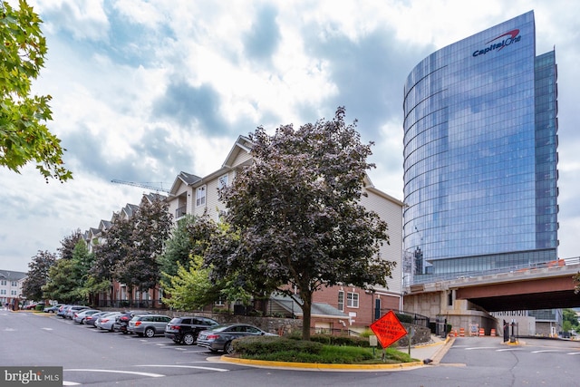 view of property featuring uncovered parking