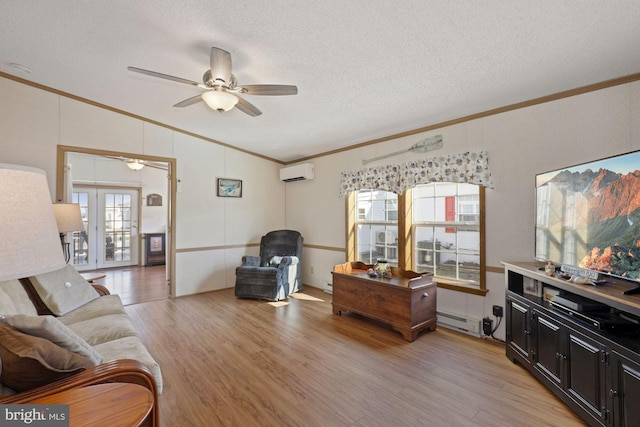 living area featuring crown molding, light wood-style floors, and a wall mounted air conditioner