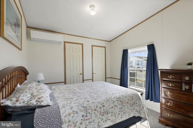 carpeted bedroom with a textured ceiling, crown molding, a wall unit AC, and vaulted ceiling