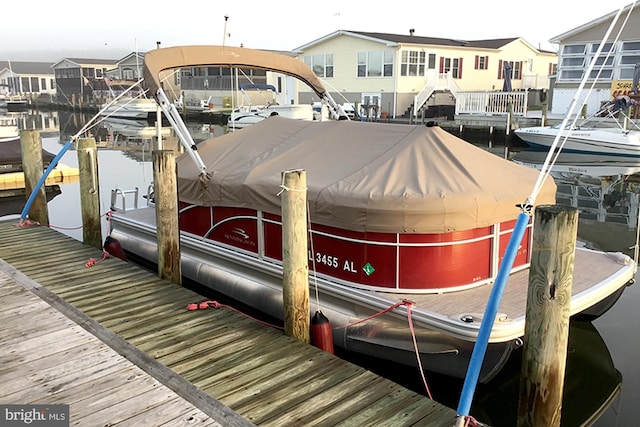 view of dock with a residential view