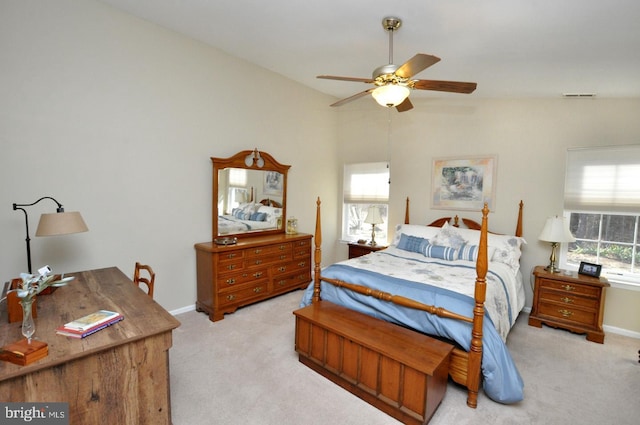 bedroom with baseboards, visible vents, ceiling fan, vaulted ceiling, and carpet flooring