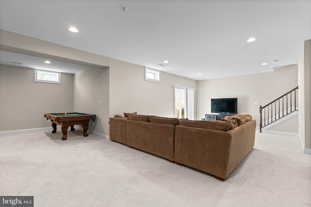 living room featuring stairway, recessed lighting, baseboards, and light carpet