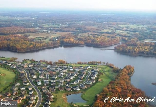 drone / aerial view featuring a water view