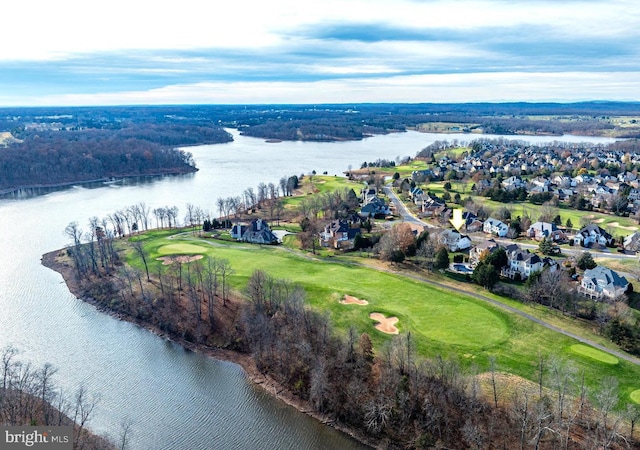 bird's eye view featuring a water view and golf course view