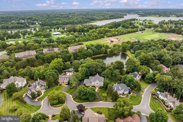 aerial view featuring a residential view and a water view