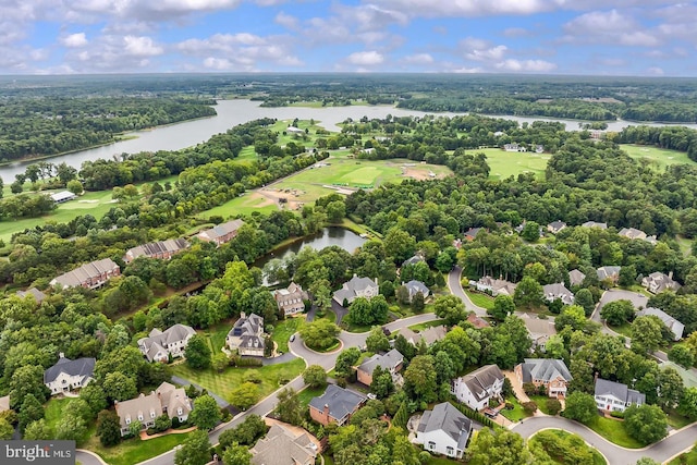 birds eye view of property with a residential view and a water view