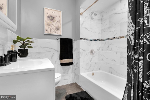 full bath featuring toilet, tile walls, vanity, and shower / bath combination with curtain