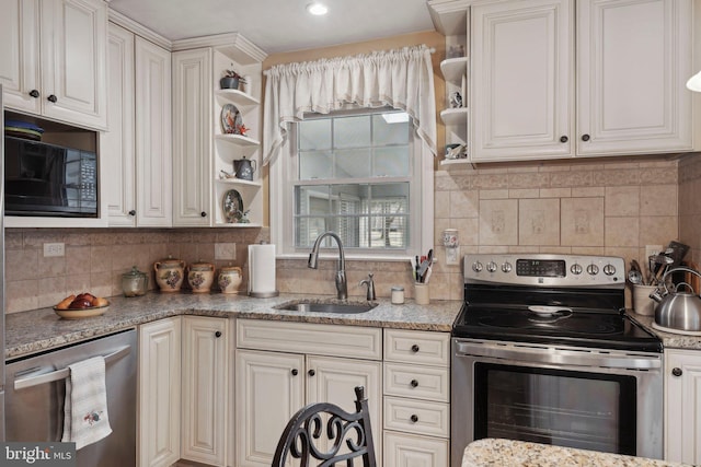 kitchen featuring a sink, stainless steel appliances, decorative backsplash, and open shelves