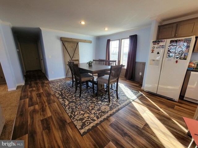 dining area with dark wood finished floors, recessed lighting, baseboards, and ornamental molding