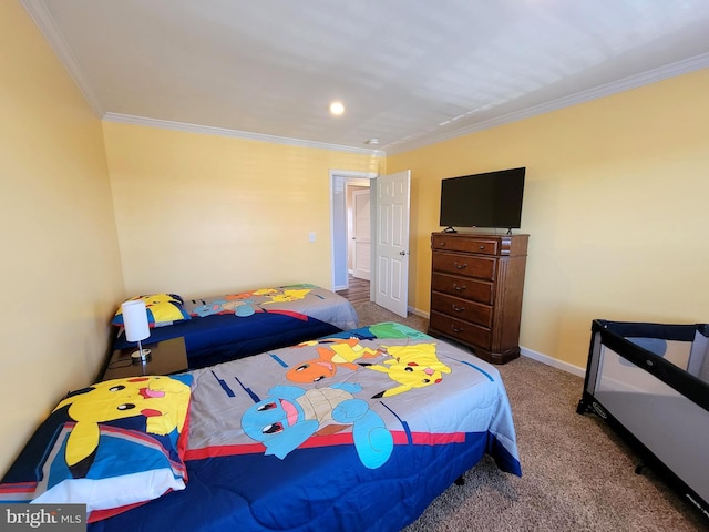 bedroom with carpet flooring, baseboards, and ornamental molding