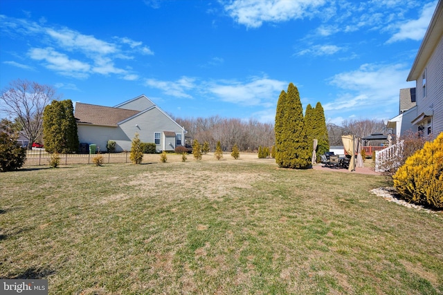 view of yard with fence