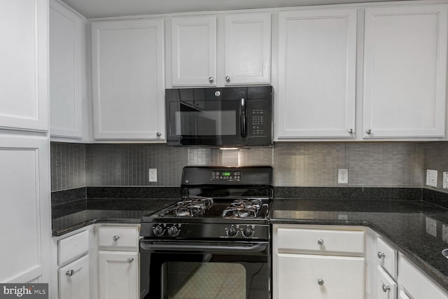 kitchen featuring decorative backsplash, black appliances, and white cabinets