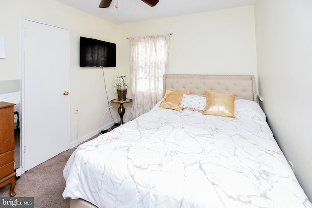 carpeted bedroom featuring ceiling fan
