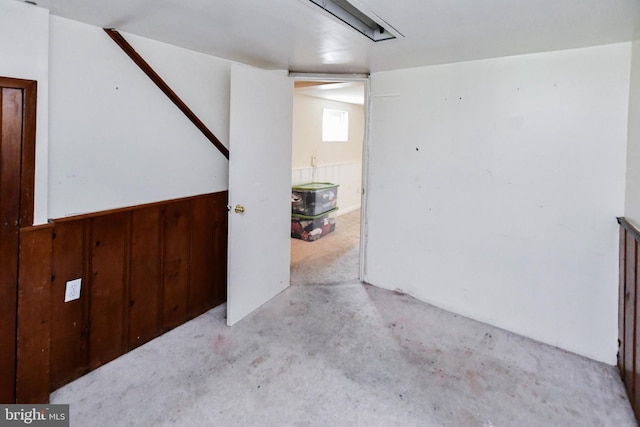 basement with wood walls