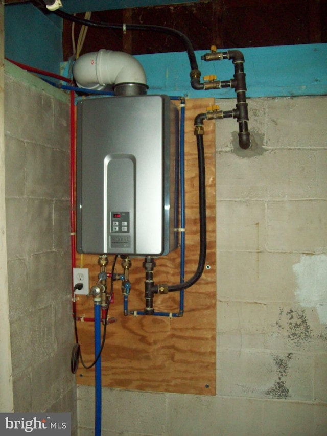 utility room with water heater