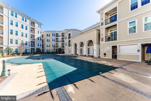 pool with a patio area