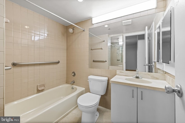 full bathroom with tile patterned floors, shower / bath combination, toilet, and vanity