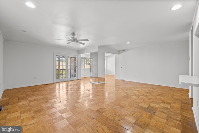 unfurnished living room featuring recessed lighting, baseboards, and ceiling fan