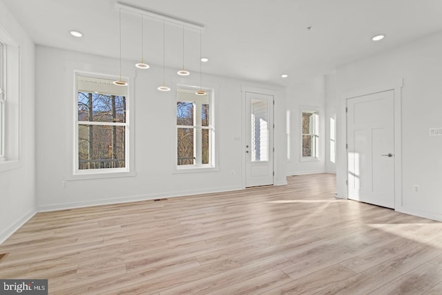 entrance foyer with recessed lighting, visible vents, baseboards, and light wood-style flooring