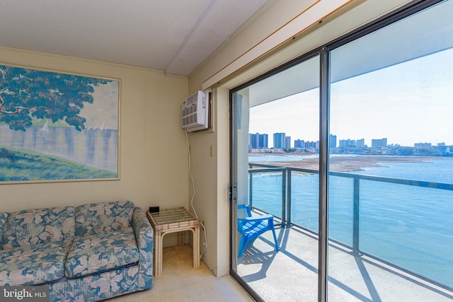 interior space featuring a city view, an AC wall unit, and carpet floors