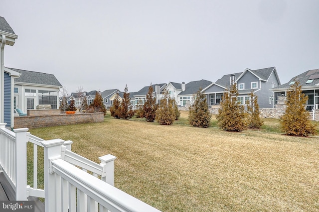 view of yard featuring a residential view