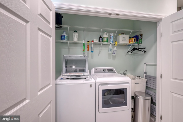 laundry room featuring laundry area and washer and clothes dryer