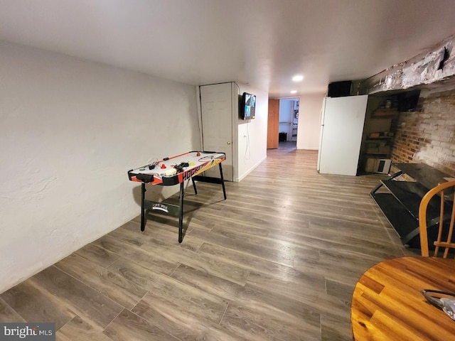 recreation room featuring recessed lighting and wood finished floors