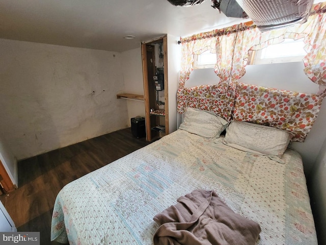 bedroom featuring wood finished floors