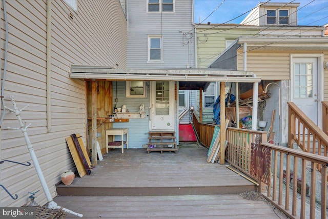 wooden terrace featuring entry steps