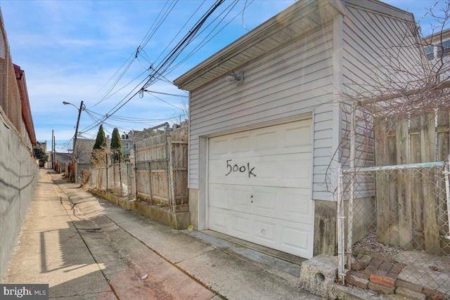 garage featuring fence