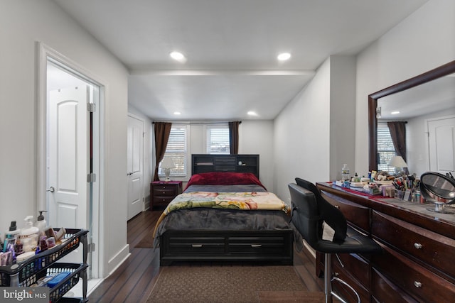 bedroom featuring recessed lighting, multiple windows, and wood-type flooring