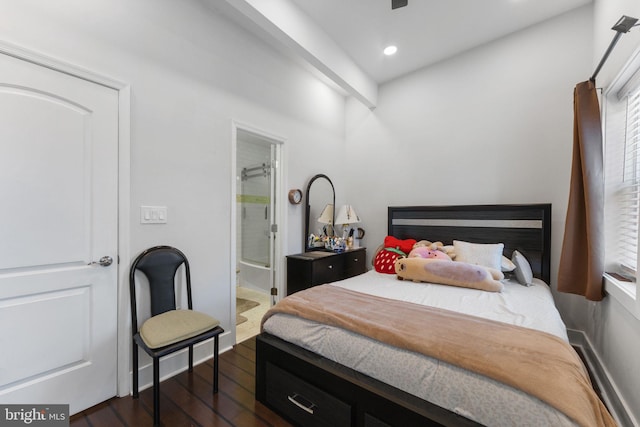 bedroom featuring connected bathroom, baseboards, dark wood finished floors, recessed lighting, and multiple windows