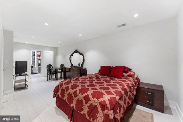 bedroom with light tile patterned floors, visible vents, recessed lighting, and baseboards