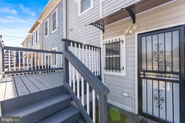 doorway to property with a deck