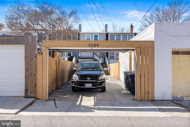 view of car parking with fence