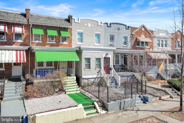 multi unit property featuring brick siding