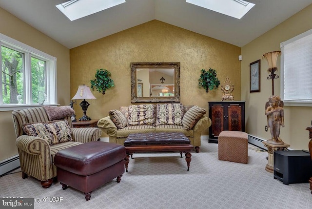 carpeted living room featuring vaulted ceiling with skylight and baseboard heating