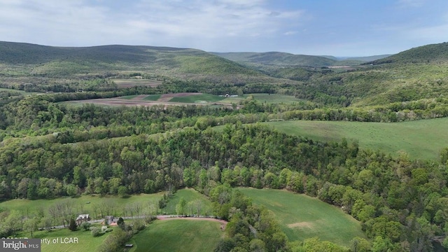 drone / aerial view featuring a mountain view