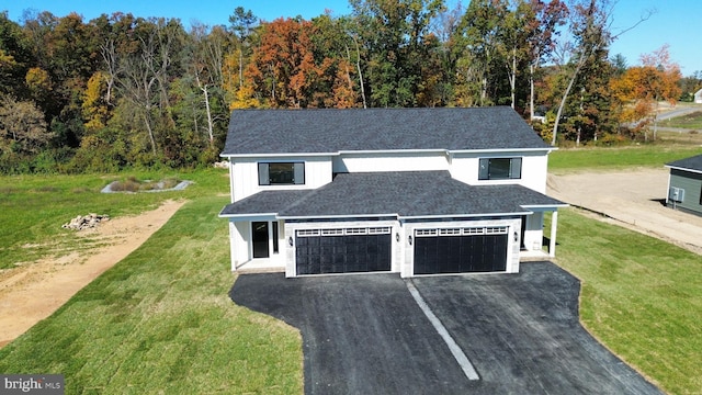 garage featuring driveway