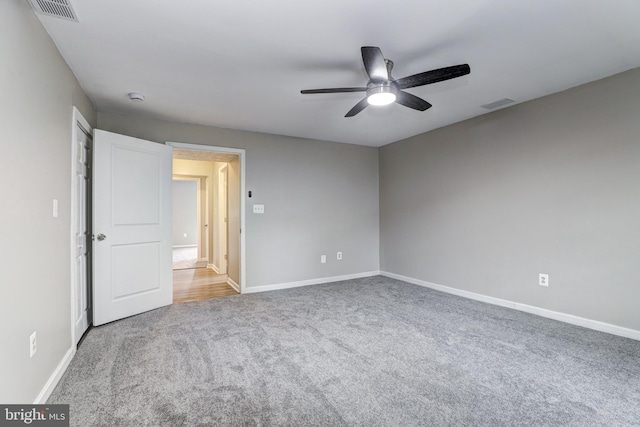 unfurnished bedroom with visible vents, ceiling fan, baseboards, and carpet floors