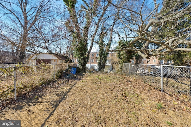 view of yard with fence