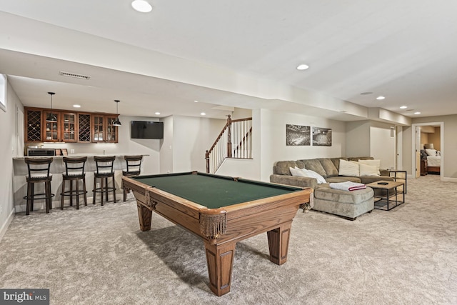 rec room featuring visible vents, baseboards, carpet floors, recessed lighting, and wet bar