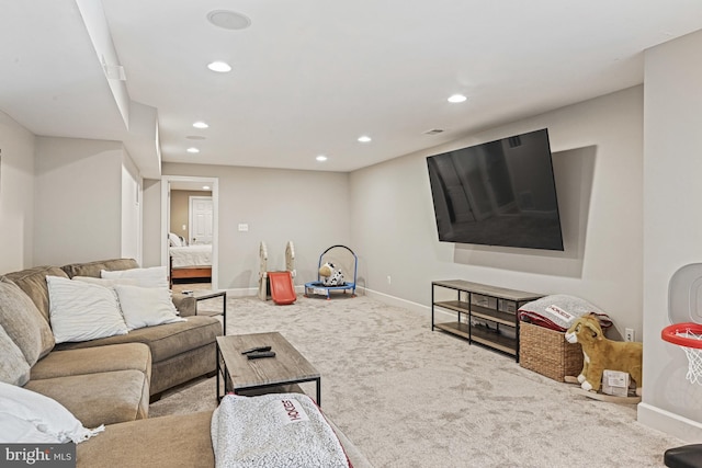 living area featuring carpet flooring, recessed lighting, and baseboards