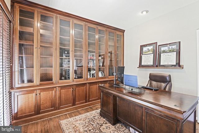 office space with recessed lighting and dark wood-type flooring