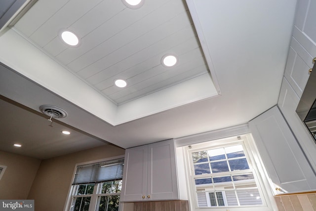 details with recessed lighting and visible vents