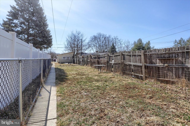 view of yard featuring a fenced backyard