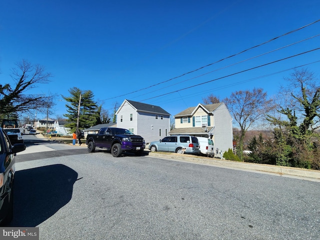 view of street with curbs