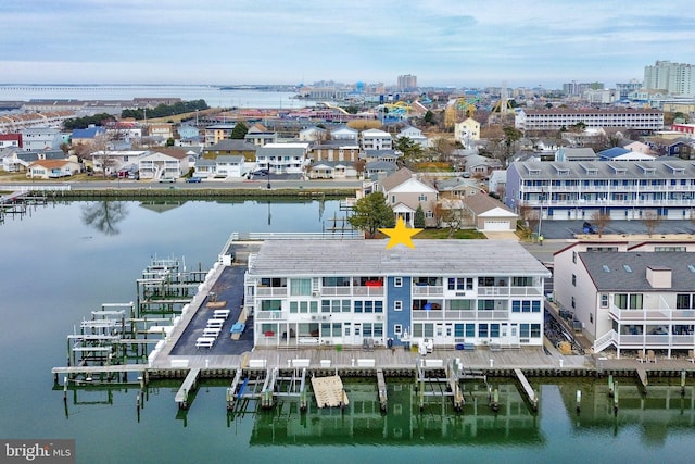 aerial view with a view of city and a water view