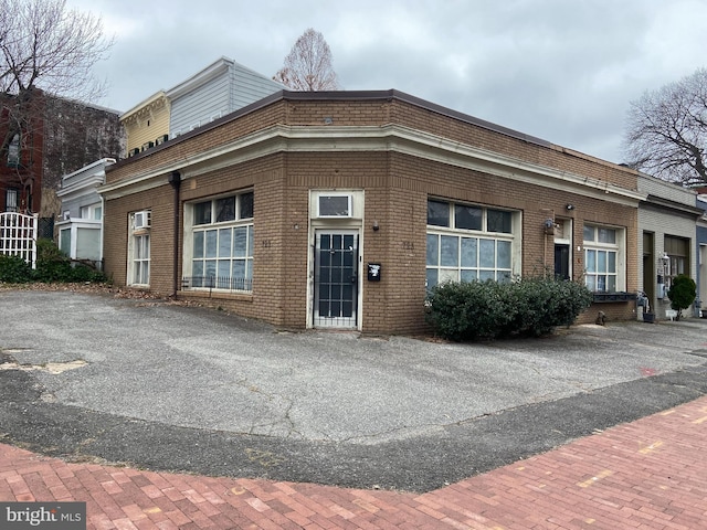 view of front of house with brick siding