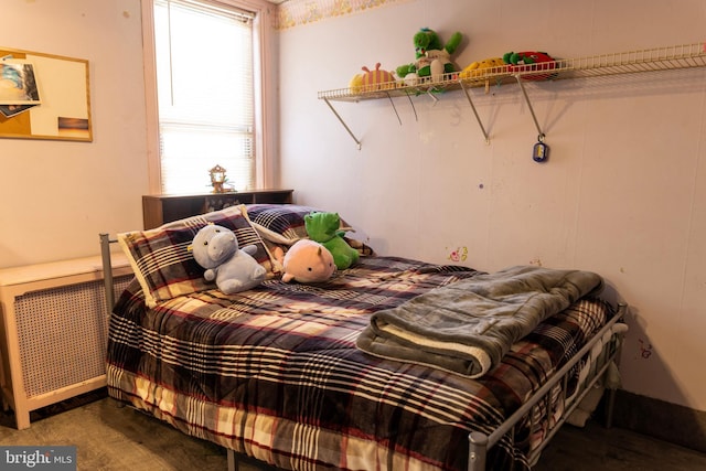 bedroom featuring wood finished floors